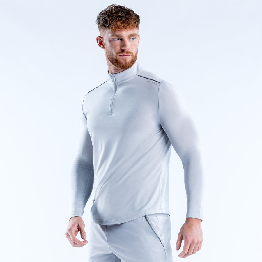 Haut quart de zip Charge Platine