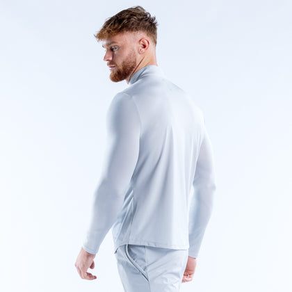 Haut quart de zip Charge